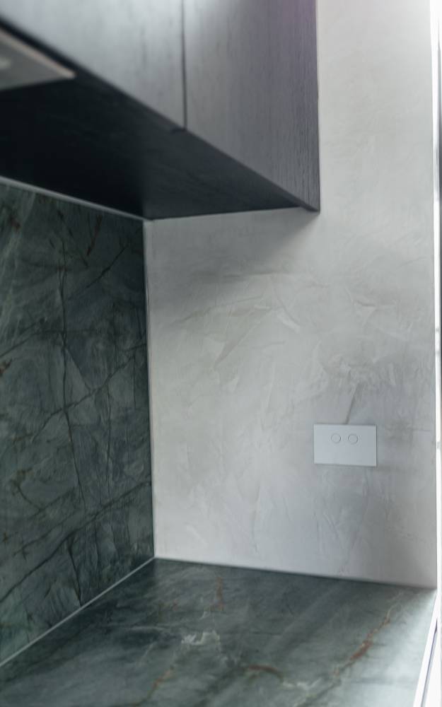 Kitchens 8 Textured microcement kitchen wall and benchtop finish